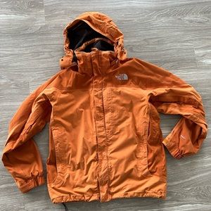 North Face Windbreaker. Detachable hood. Sleeves have zippered vents.